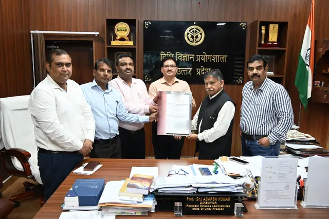 Officials of the Forensic Science Laboratory, Gorakhpur receiving their ISO certificate from the Certsure Certification team at the office of the Director, Forensic Science Laboratories, Uttar Pradesh