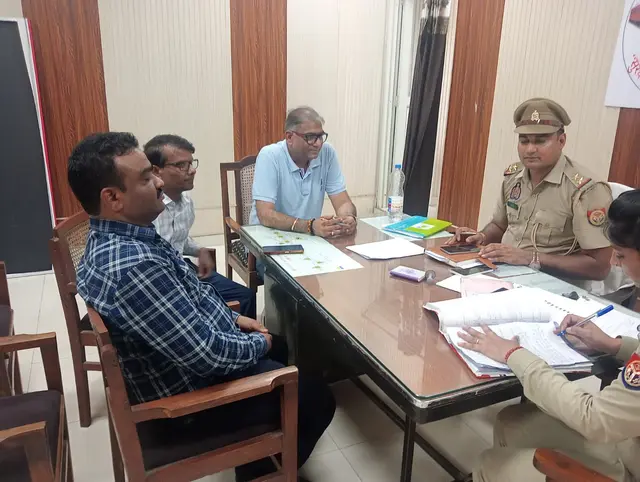Certsure auditors in a review meeting with the police station in-charge and staff during an ISO audit