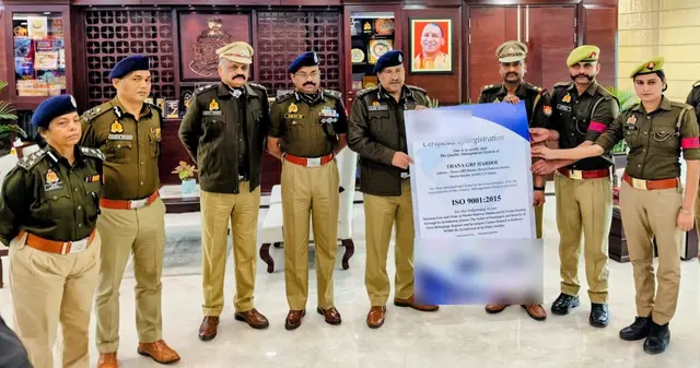 Senior railway police officers holding the ISO 9001:2015 Certificate of Registration for the quality management system of Thana GRP Hardoi